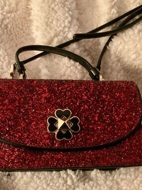 Kate Spade Odette red Glitter Crossbody with Floral Medallion-